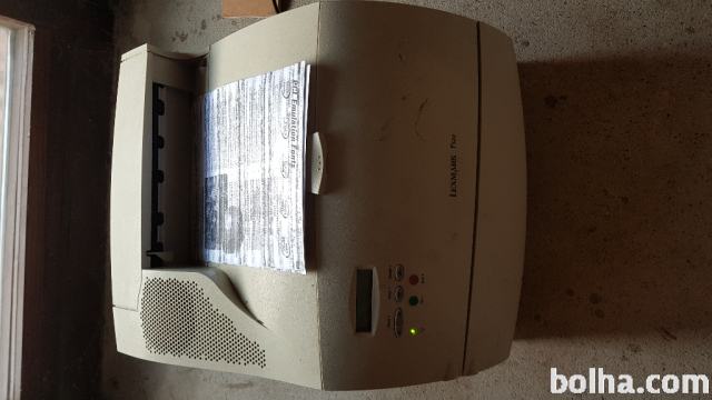 Laserski tiskalnik Lexmark T520 okvarjen
