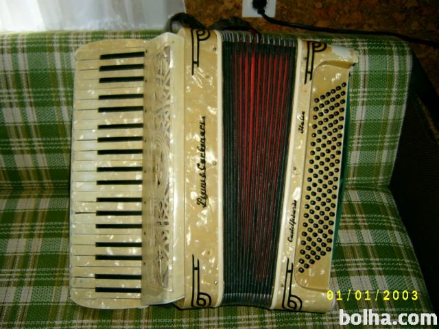 Zelo stara klavirska harmonika PIGINI