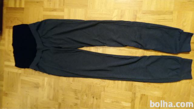 Nosečniške hlačešt.38 temno modre barve z žepi