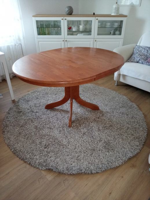 Prodam leseno raztegljivo okroglo mizo , pokrito s steklom -110cm