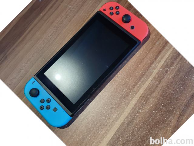 Nintendo Switch + 3 igre + torbica