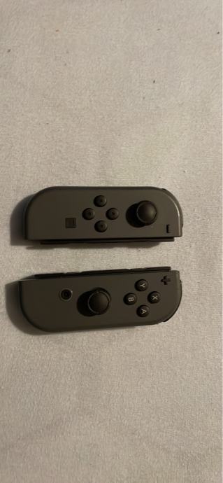 Nintendo Switch (V2)+ dve igri