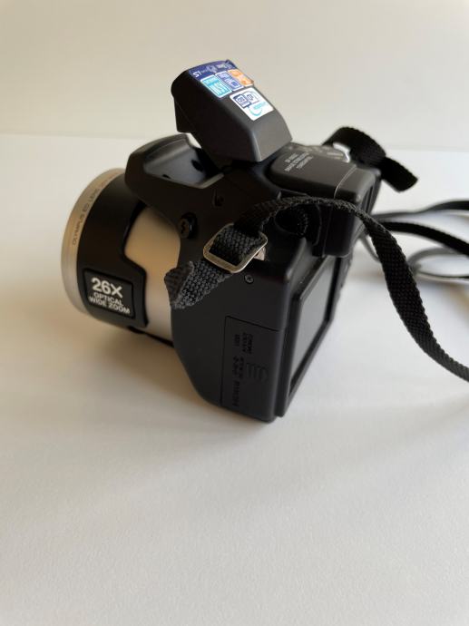 Digitalni fotoaparat OLYMPUS SP590UZ(slikanje in tudi snemanje!)