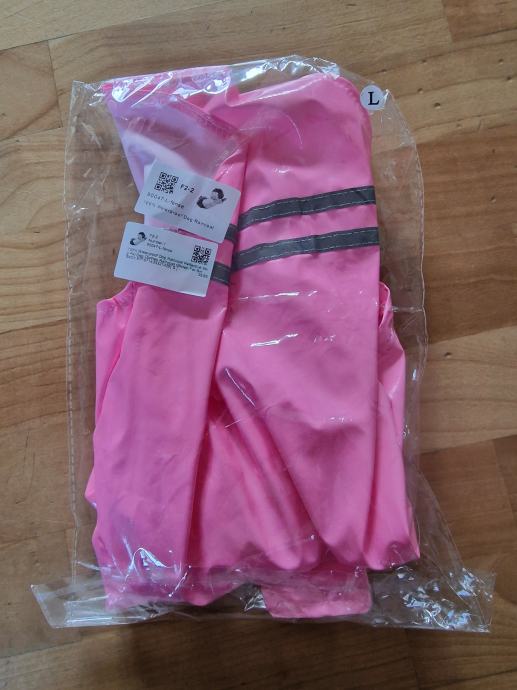 Dežni plašč roza barve za psa nov zapakiran