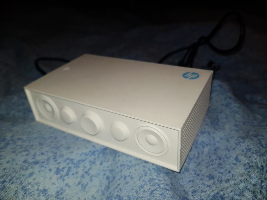 Prenosni zvočnik HP - ojača zvok na podlagi kontakta, brez povezave