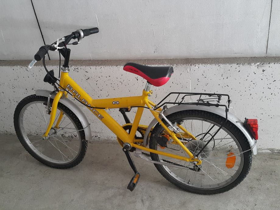 Otroško kolo rumeno prodam