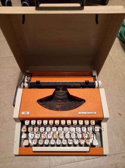 Pisalni stroj UNIS