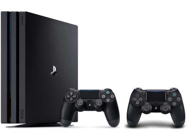 PlayStation 4 PRO 1TB + 2x joystick + charging station + igre
