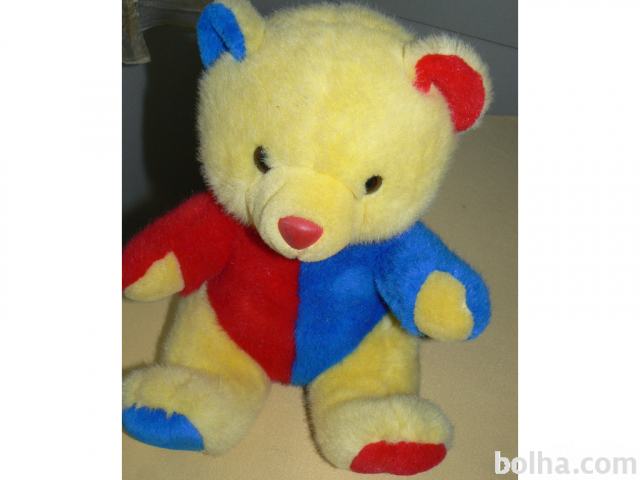 Ljubek medved v rumeni, rdeči, modri barvi, vel. 36 cm