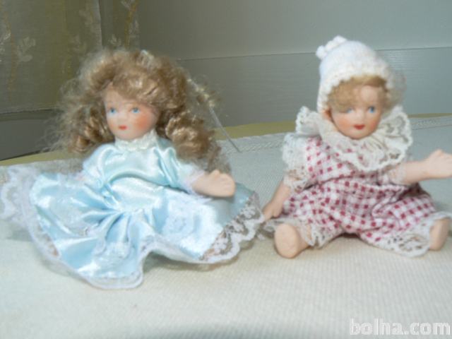 Porcelanasti  punčki (komplet), višina 11 in 9,5 cm