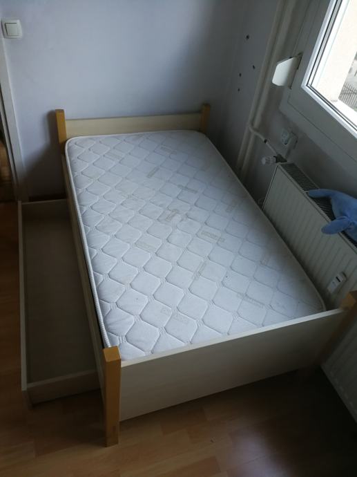 Prodamo posteljo dim. 170 x 95 cm, s predalnikom in novo vzmetnico