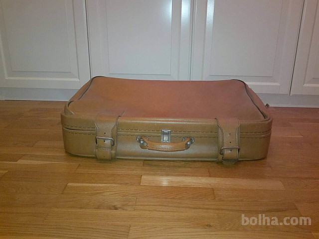 Usnjen potovalni kovček