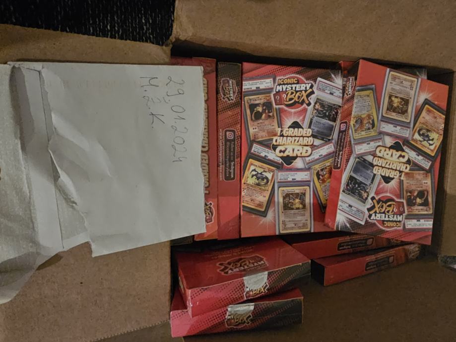 Pokemon Iconic Mystery Charizard Boxes PSA, CGC, BECKETT