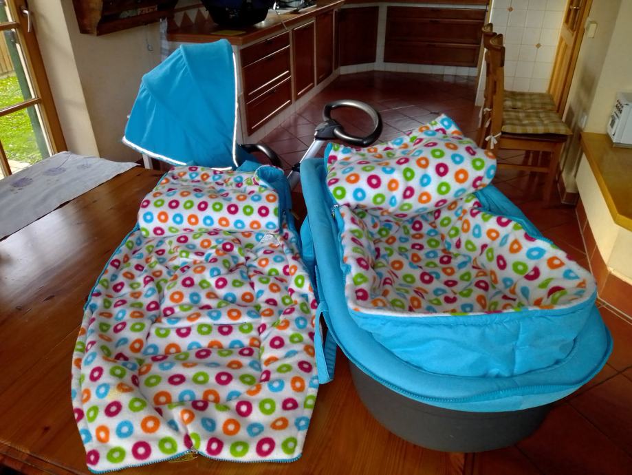 Lepo ohranjen otroški voziček in potovalna posteljica