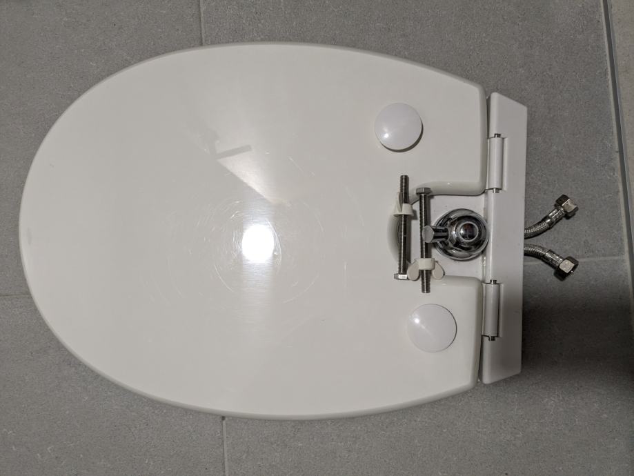 WC deska s fiksnim perlatorjem - Colbidet