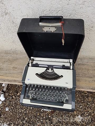 Pisalni stroj Unis TBM